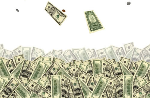 bills and coins flying into a pile of cash